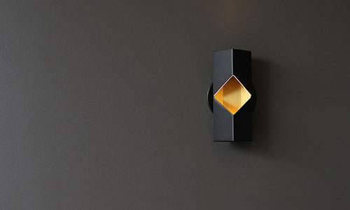 Luminaria de pared Phase para RBW. Diseño por David Rockwell